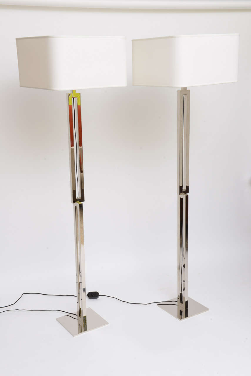 ...SOLD....A pair of iconic floor lamps called 